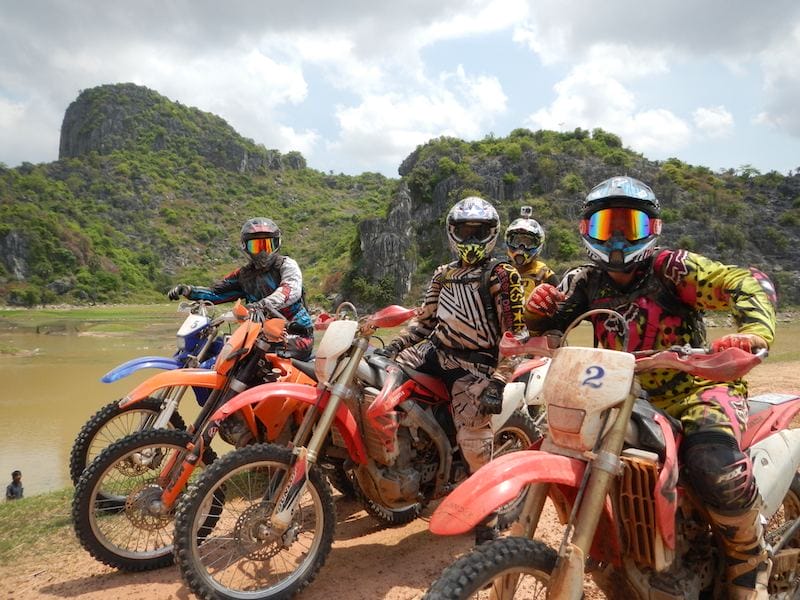 Crossing The Border With A Motorbike Between Laos And Cambodia