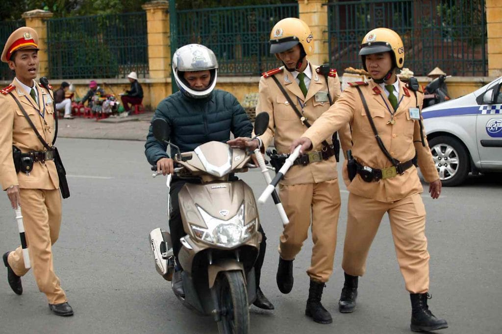  What should you do if the police in Vietnam stop 
